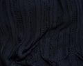 Close-up of black textured fabric, fabric texture background, sewing Royalty Free Stock Photo