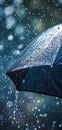 Close up, black umbrella under rainfall against a background of water droplets splashing. Concept of rainy weather. Royalty Free Stock Photo