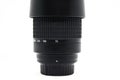 Close-up of black upright camera lens isolated on white background Royalty Free Stock Photo