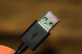 Close up of black USB cable isolated, cable USB connection Royalty Free Stock Photo