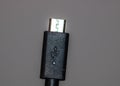 Close up of black USB cable isolated, cable USB connection Royalty Free Stock Photo
