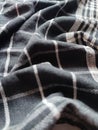 Close-up of black white checkered napkin or picnic tablecloth texture, kitchen accessories Royalty Free Stock Photo