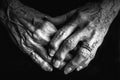 A close up black and white image of an elderly woman\'s arthritic hands. Royalty Free Stock Photo