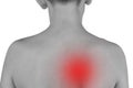 Black and white photograph of the back with shoulder blade pain. The red color further illustrates the pain