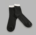 Close up of black and white socks on white background