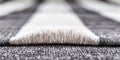 Close-up of black and white woolen fabric pattern with textured yarn Royalty Free Stock Photo