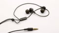 Close up of black wired earphones Royalty Free Stock Photo