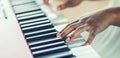 Close-Up a black woman hands playing on piano Royalty Free Stock Photo