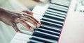 Close-Up a black woman hands playing on piano Royalty Free Stock Photo