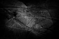 Close-up black worn textured stone surface background Royalty Free Stock Photo