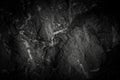 Close-up black worn textured stone surface background Royalty Free Stock Photo