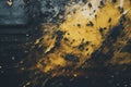 a close up of a black and yellow paint splattered wall Royalty Free Stock Photo