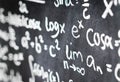 Close up of blackboard full of math equation, formula and number