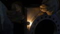 Close up of blacksmith welder in protective uniform works with metal steel and iron using a welding machine. Creative Royalty Free Stock Photo