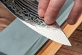 Close-up on a blade made of Damascus steel