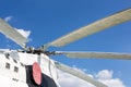Close-up blade rotors of big cargo-passenger helicopter against blue sky on background Royalty Free Stock Photo