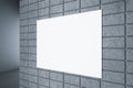 Close up of blank white underground banner on concrete tile wall on hallway background. Royalty Free Stock Photo