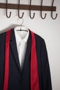 Close-up of blazer hanging on hook