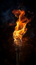 Close up A blazing torch illuminates darkness with fierce, captivating flames