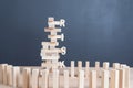 Close up blocks wood game with word risk on tower wood block wo Royalty Free Stock Photo