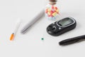 Close up of blood sugar test stripe and glucometer Royalty Free Stock Photo