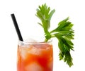 Close-up of bloody mary with ice cubes with celery on white Royalty Free Stock Photo