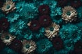 Close up of blooming flowerbeds of amazing teal flowers on dark moody floral textured background