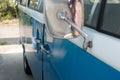 Close up of a blue car and rear view mirror Royalty Free Stock Photo