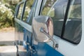 Close up of a blue car and rear view mirror Royalty Free Stock Photo