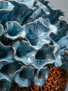 Close-up of Blue Ceramic Flower Sculpture