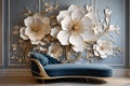 Close up of a blue chaise lounge in front of a wall with large white and golden flowers