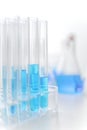 Close up of blue chemical liquid into test tube in clean laboratory room