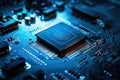 Close-up of a blue circuit board with a central microchip processor