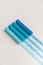 Close up of blue color pastel crayon chalks over its own trace l Royalty Free Stock Photo