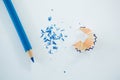 Close-up of blue color pencil with pencil shaving Royalty Free Stock Photo