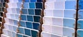 Close-up of blue color swatch paint chips at a home improvement store. Royalty Free Stock Photo