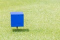 Close-up blue color wooden tee off area or tee box with natural Royalty Free Stock Photo