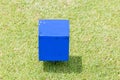 Close-up blue color wooden tee off area or tee box with natural Royalty Free Stock Photo