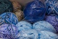 Close up of blue coloured balls of wool and yarn