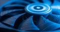Close up of a blue computer fan showcasing its design and cooling technology system Royalty Free Stock Photo