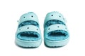 Close-up of blue Crocs sandals. Isolated on white background