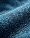 Close-up of blue denim fabric with visible texture and stitching Royalty Free Stock Photo