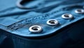 Close-up of blue fabric with metal grommets Royalty Free Stock Photo