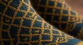 Close-Up of Blue and Gold Knitted Socks with Geometric Pattern Royalty Free Stock Photo