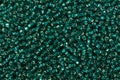 Close up of blue and green seed beads. Royalty Free Stock Photo