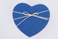 Close up blue heart-shaped gift box. Royalty Free Stock Photo