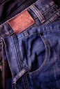 Close up Blue jeans on old wood background. Pocket on blue jeans. Royalty Free Stock Photo
