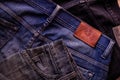 Close up Blue jeans on old wood background. Pocket on blue jeans. Royalty Free Stock Photo