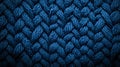 A close up of a blue knitted fabric with a pattern Royalty Free Stock Photo