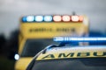 Close-up of blue light flasher on roof of ambulance car